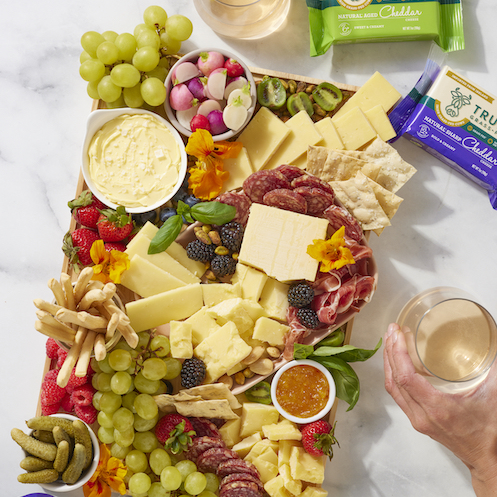 cheese board with fruit and nuts