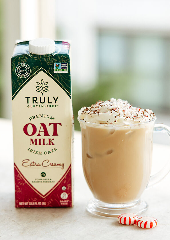 oat milk with mug of iced mocha